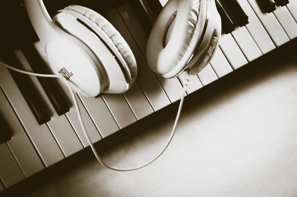 piano, keyboard, music, musical, instrument, classical, horizontal, orderliness, headphones, headset over piano keys, headset over piano, headset, audio, technology, sound, studio, clavier piano mix, piano mix, yellow, old, brown, lighting, light, brown technology, brown music, brown piano, brown keyboard, brown key, brown headphones, piano, music, headset, headset, headset, headset, headset, studio, piano mix